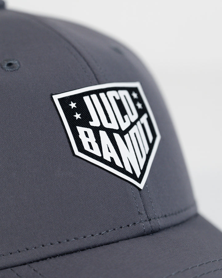 Eric Sim King of Juco Bandit grey performance hat logo
