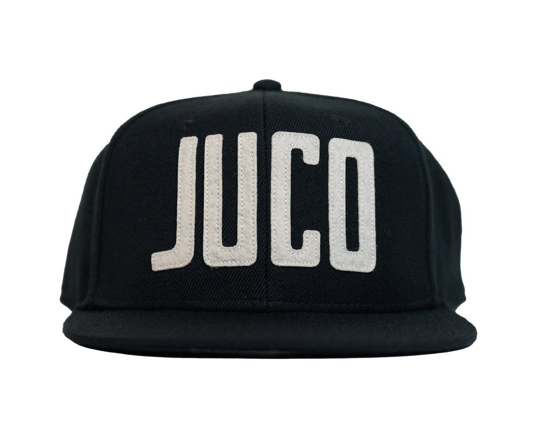 Eric Sim King of Juco Snapback hat black front